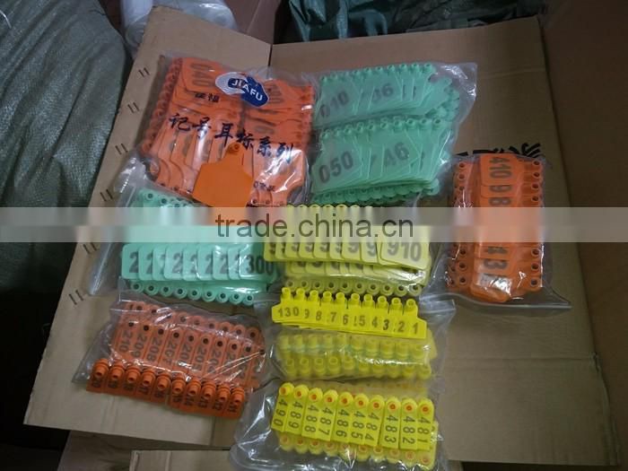 orange sheep ear tag