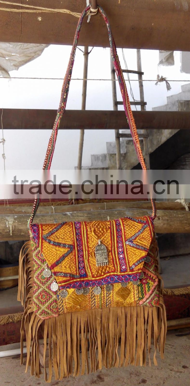 Multicolor banjara sling bag with suede fringes coin bags