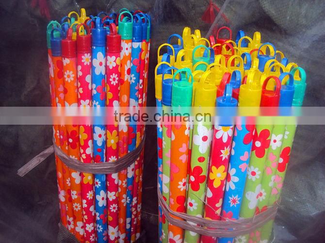 plastic covered wooden broom sticks